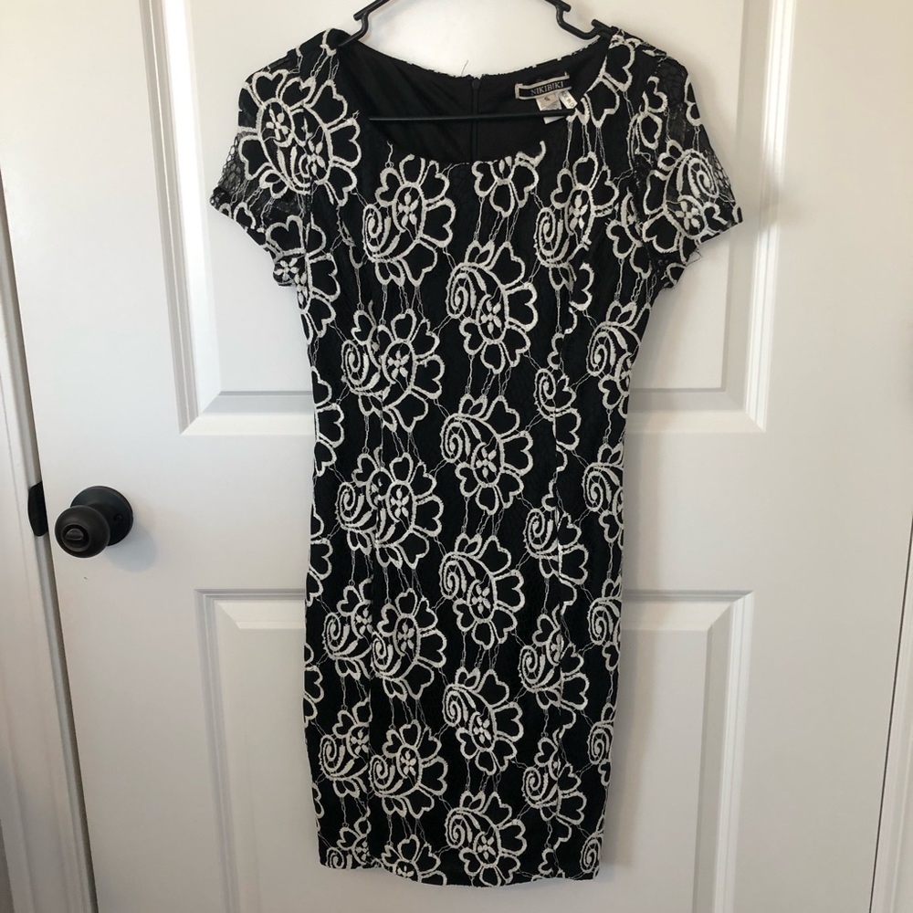 NIKIBIKI - Timeless black & white lace dress.